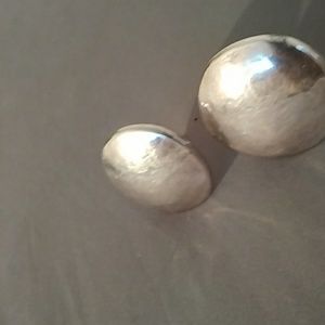 Oversized 925 SS round-shaped clip earrings.